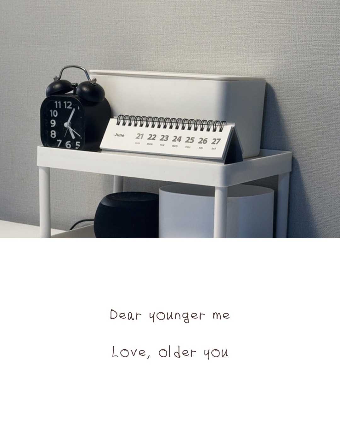 A handwritten postcard over a cozy desk: Dear younger me, Love older you